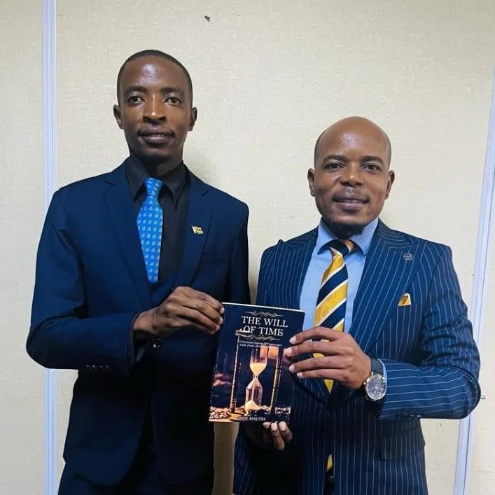 Fungayi Antony Sox presenting a copy of The Will of Time to its author, Lindi Mautsa.